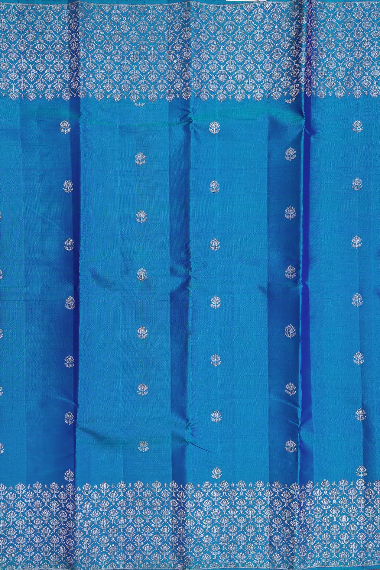 Kanchipuram Silk Saree In Teal Blue With Floral Buttas - Image 3