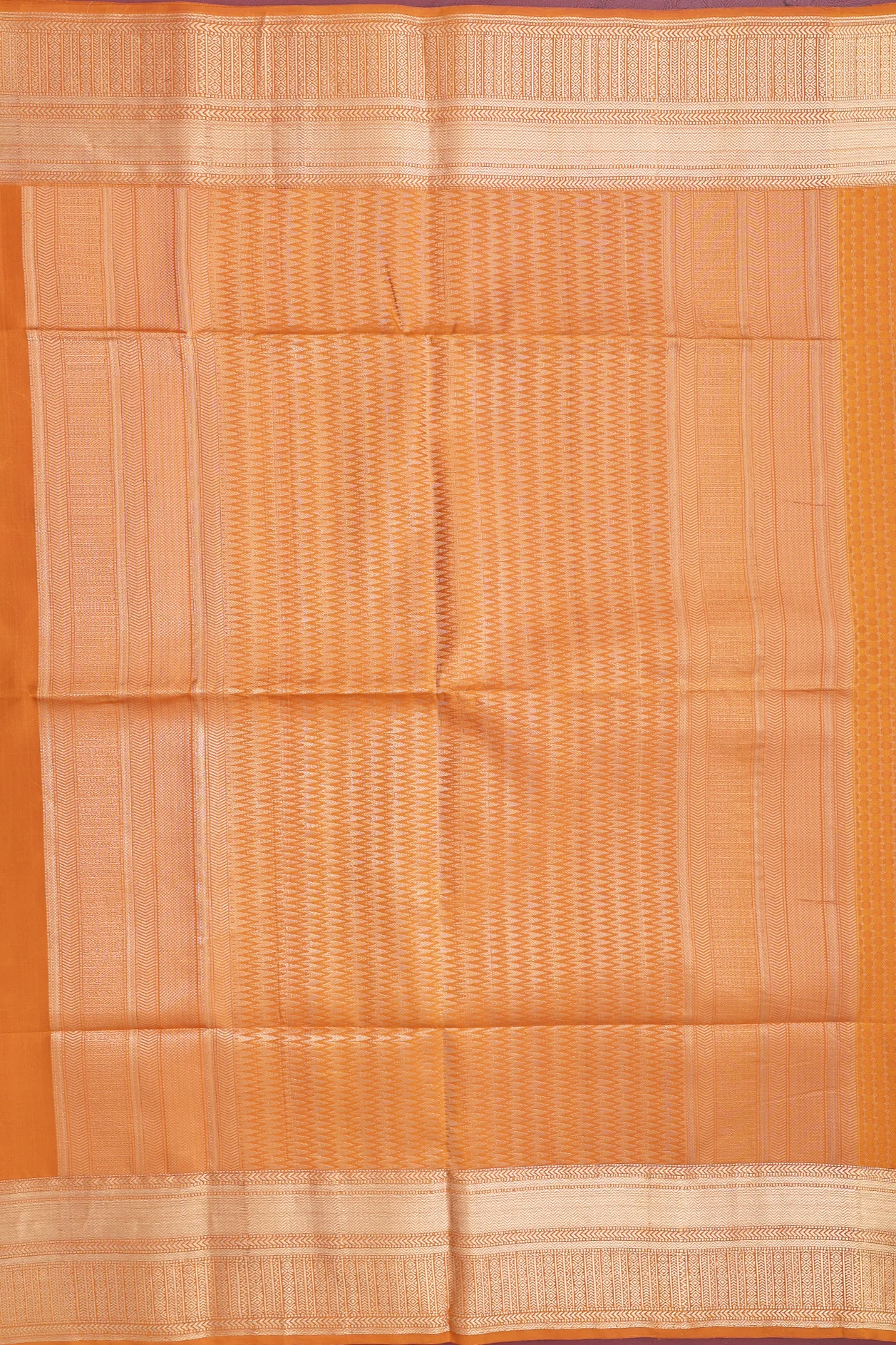Soft Silk Saree In Ochre Orange With Allover Design - Image 4